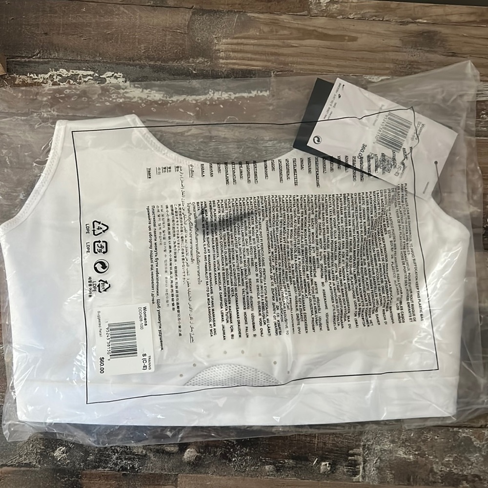 Brand new still in unopened bag! Nike women’s white sports bra